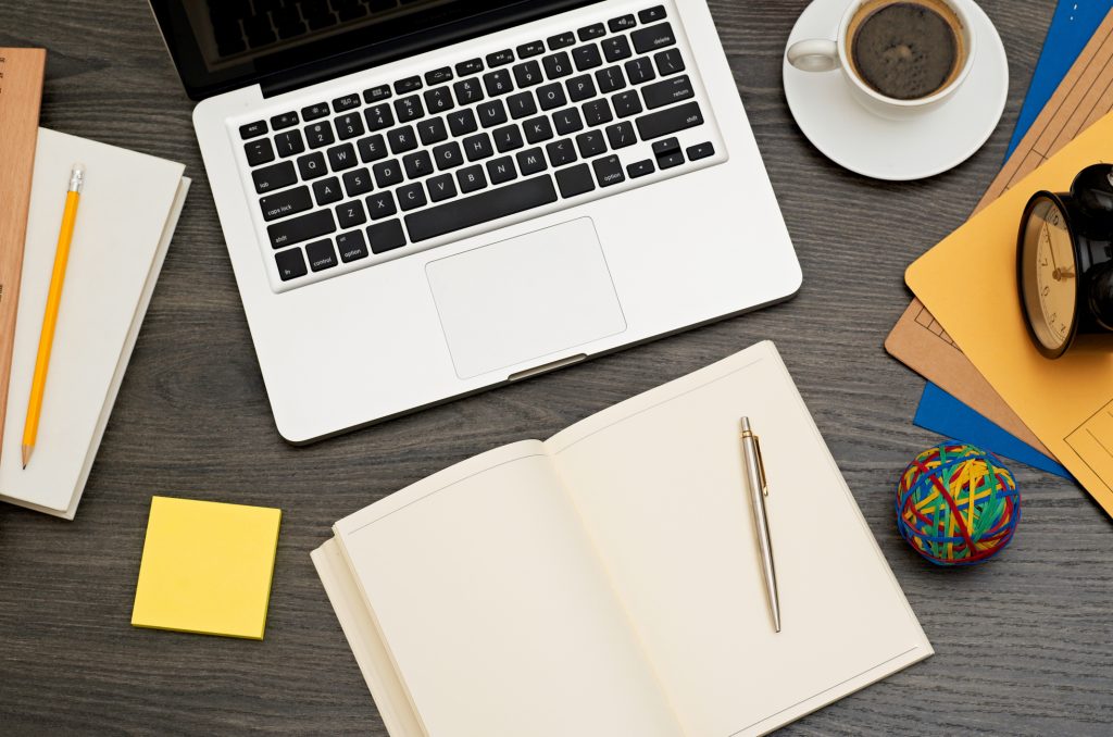 Office desk with laptop with business accessories